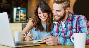 couple at computer planning