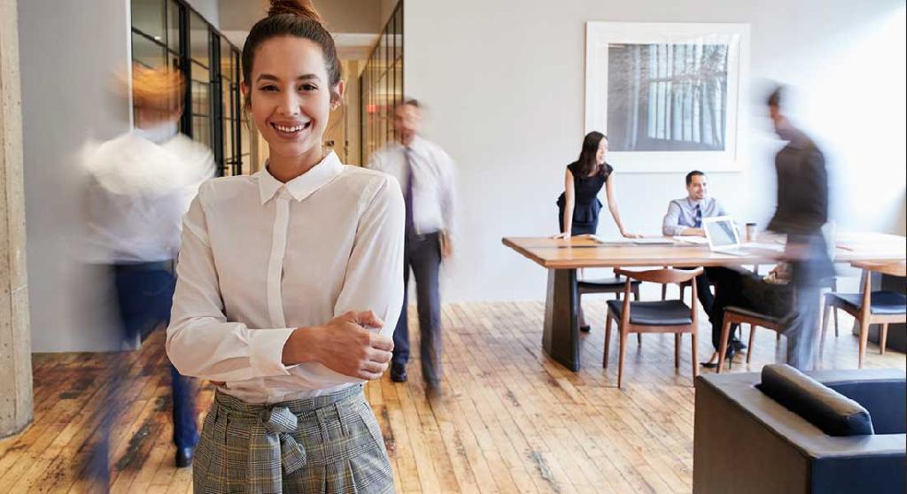 woman in a busy modern workplace