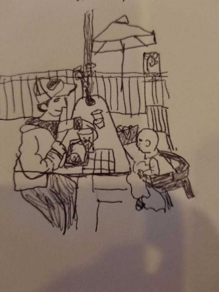 a drawing of a man and a baby seated at a table