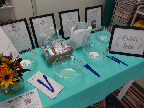 DSC01348_editted a table at the Skyland Trailblazers event with sign-up sheets and gift packages