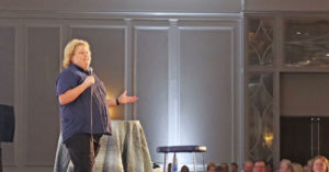 Comedian Fortune Feimster entertains the crowd on stage at the 2021 Benefits of Laughter fundraising event.