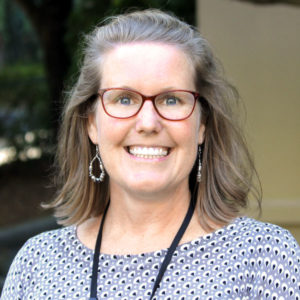 A portrait photo of a smiling Shelley Danser