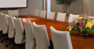 The Allison F. Williams Boardroom at Skyland Trail. A photo of a long table with chairs lining the sides.