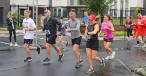 Participants in the Skyland Trail 5K Run/Walk take off from the starting line