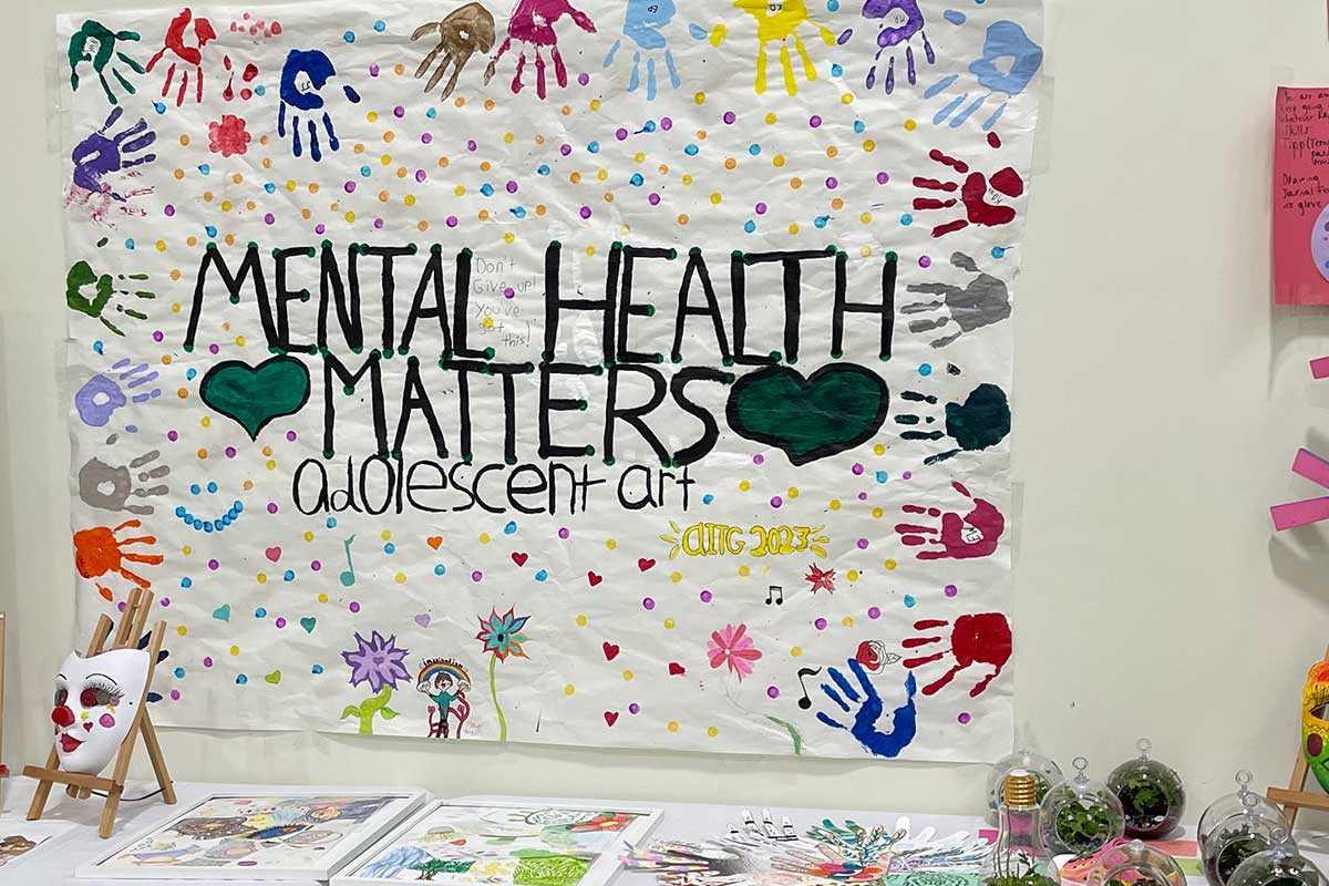 arts-in-the-garden-education painted banner that reads Mental Health Matters